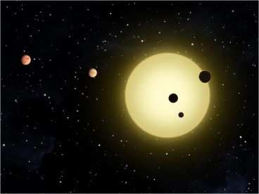 Two new exoplanets, Kepler 20e and 20f, are part of a five-planet system orbiting a sun-like star, similar to the artist’s rendering above. Researchers have found the new planets are likely scorching hot, circling their star at a much closer distance than Mercury orbits the Sun - Image: Tim Pyle/NASA